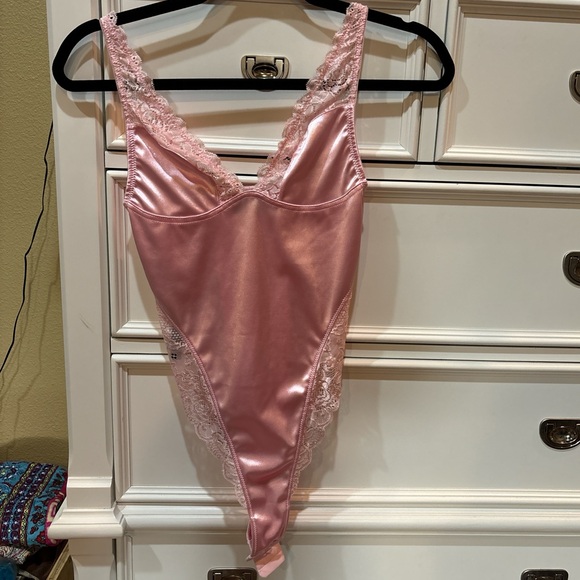 Urban Outfitters Tops - Urban outfitters pink bodysuit